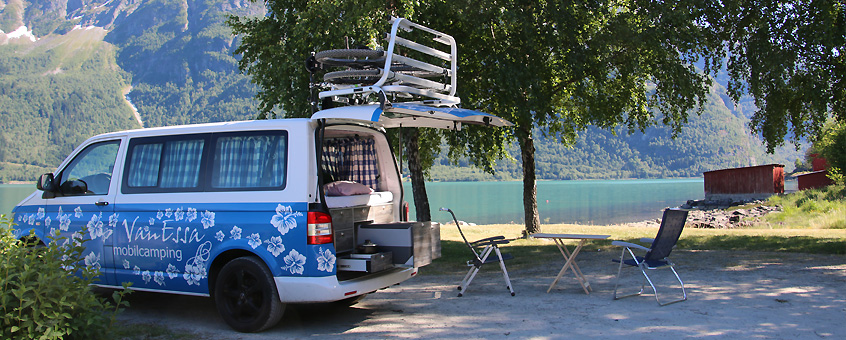vw campervan T5 Transporter at the lake in Norway with camping box
