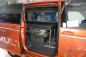 Preview: VanEssa sleeping system Surfer split to kitchen double bed with folded seats in VW T7 Multivan