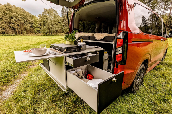 VanEssa rear pull-out Riva kitchen unit side view with pull-out drawers and side table
