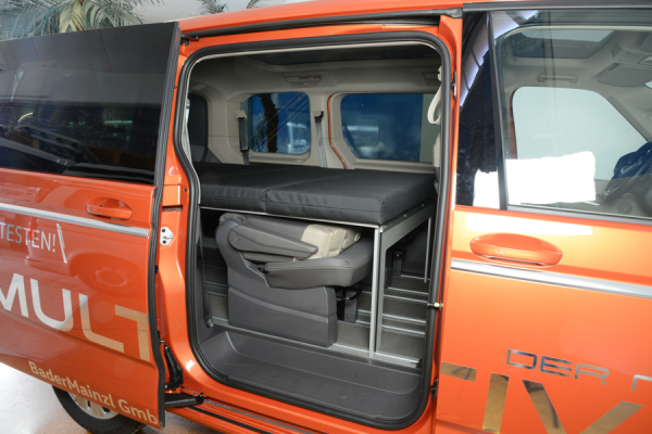 VanEssa Surfer sleeping system in the VW T7 Multivan with folded individual seats